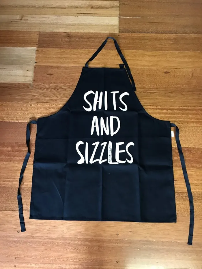 KITCHEN LANGUAGE Vibrators KITCHEN LANGUAGE SHITS AND SIZZLES APRON